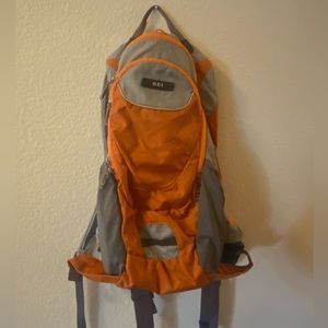 Orange REI Day Hiking Pack